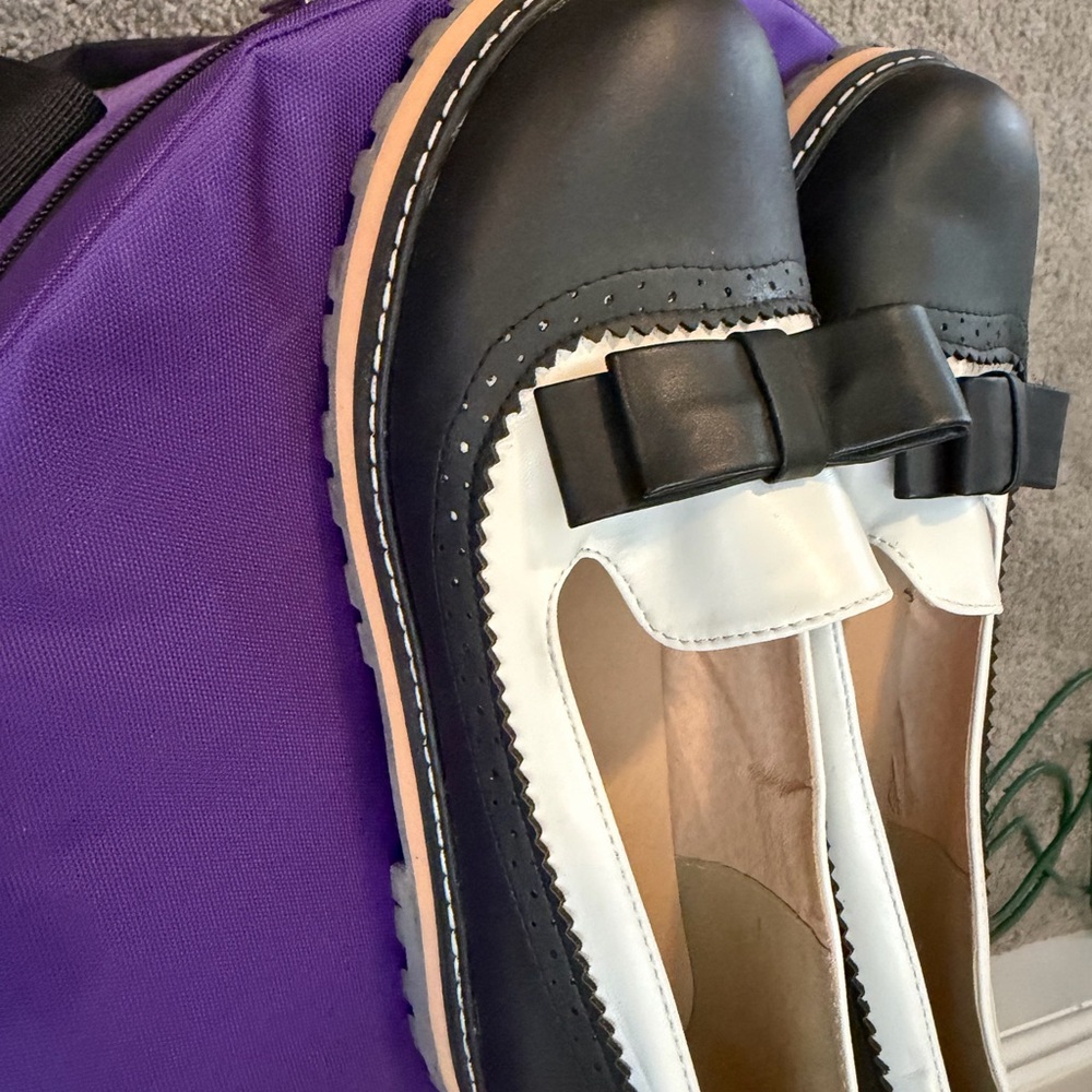 Women’s Two-Tone Black and White Bow Loafers